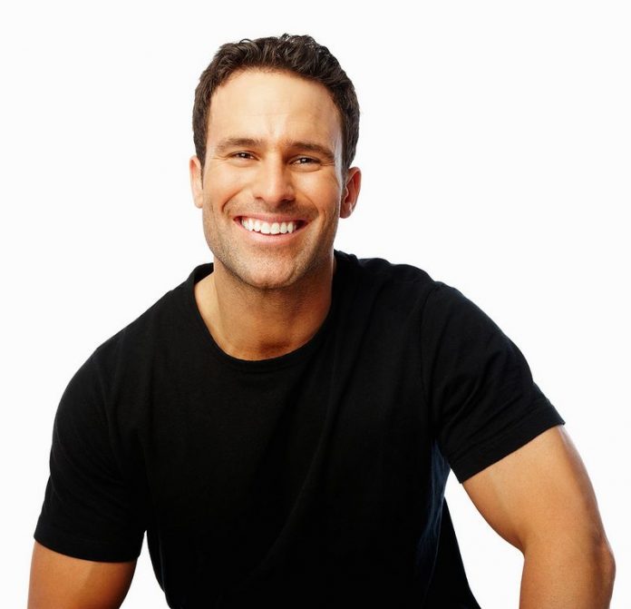 bigstock_a_handsome_man_smiling_against_4926775