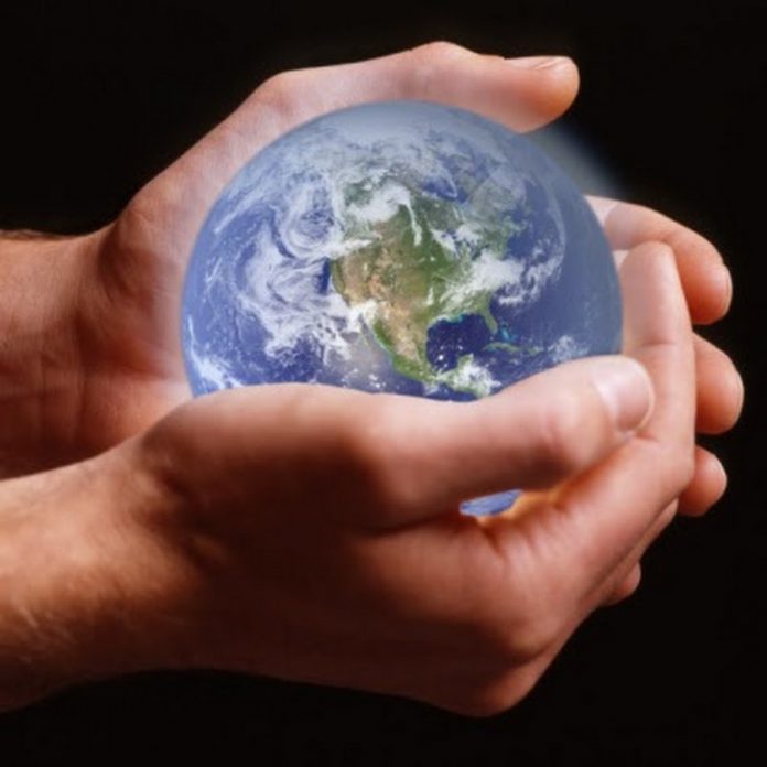 Person holding planet earth